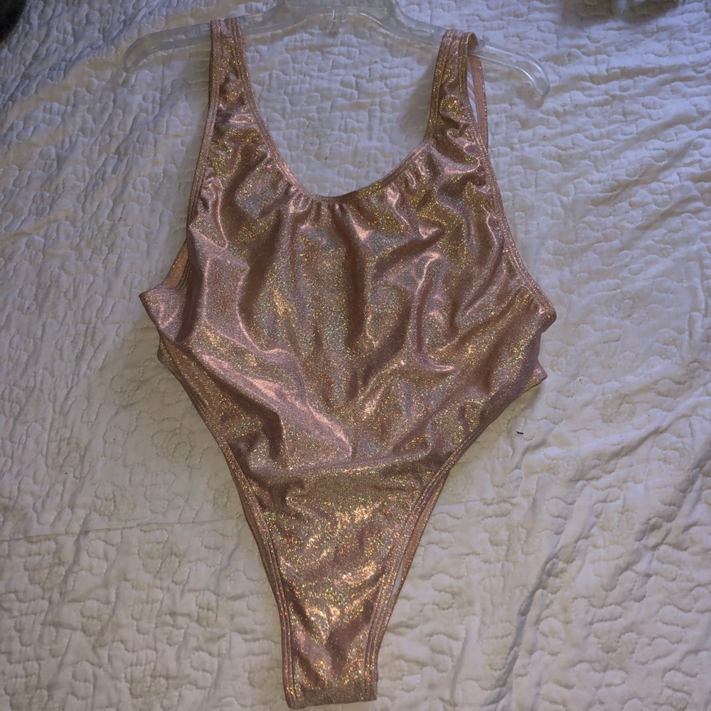 iheartraves rose gold holographic bodysuit ✨